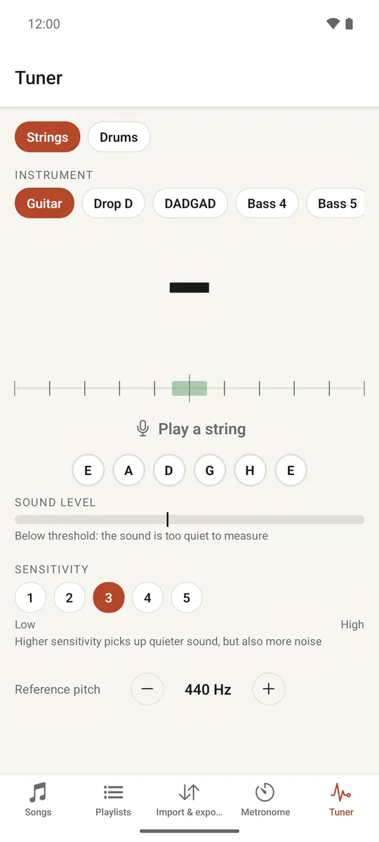The string tuner showing a note name and a tuning gauge